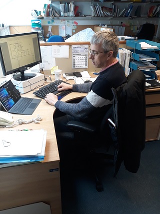Derek Allan, Building Inspector, at work at the Council offices.