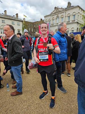 Ewan’s all smiles as he completes the London marathon