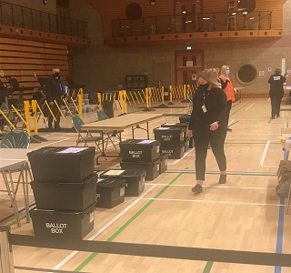 Getting ballot boxes ready for the count.