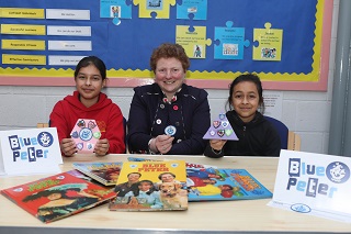 Wendy Bowen with pupils Lisamarie and Daniella who realised her childhood dream of owning a Blue Peter badge.
