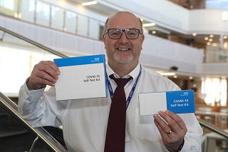 Don Hawkins with COVID test kits.