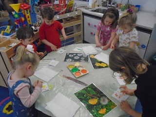 Evie school bairns creating artwork.