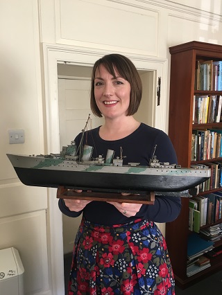 Ellen Pesci, Orkney Museum, with Jack's model boat.