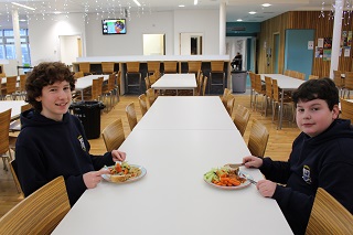 Kavan and Kilian Kynoch tucking into freshly prepared school meals.