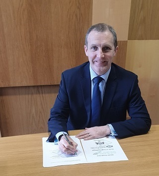 Michael Matheson, Cabinet Secretary for Transport, Infrastructure and Connectivity - signing.