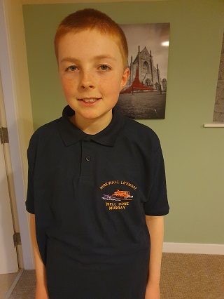 Murray wearing his Kirkwall Lifeboat polo shirt.