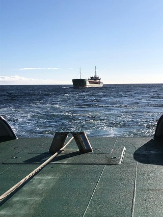 Odain of Scapa in a rescue tow.