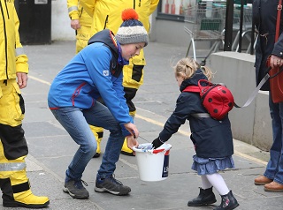 Murray and RNLI on a bonus bucket collection in Kirkwall.