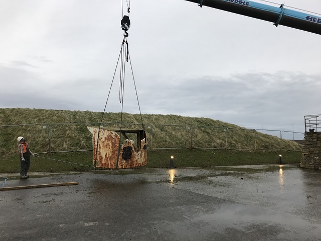 Shield from Bremse gun gently lowered to the ground after the original bolts holding it in position had been carefully unscrewed.