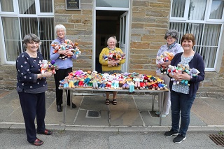 Members of the Orkney Scottish Women's Institute outside their premises in Kirkwall.