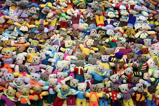 Loads of knitted teddy bears made by the SWI.