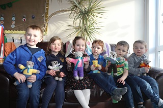 Children with Teddy Bears.