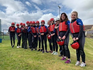 Outdoor education the group of young prople taking part.