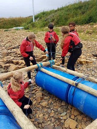  Outdoor education - learning to build a raft.