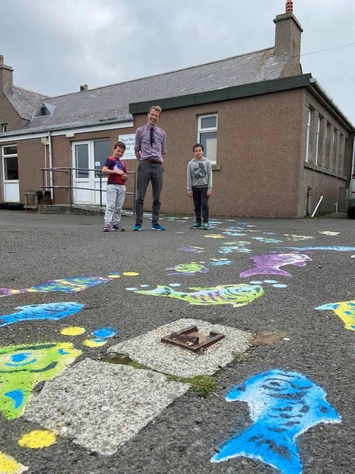 Papay pupils with their fishy artwork.