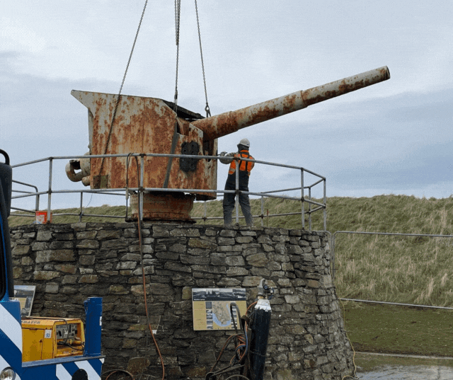 Slideshow of photos showing the Bremse gun being loaded onto a lorry for conservation - and how it looks now the work has completed.