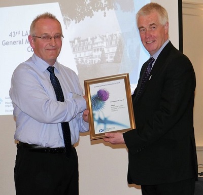 Jack Leslie – Orkney Islands Council being presented with the award by Stephen Garvin BSD.