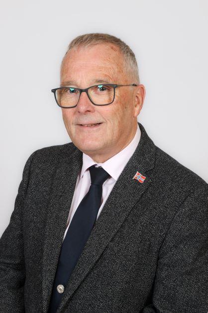 A portrait of Councillor Duncan Tullock.