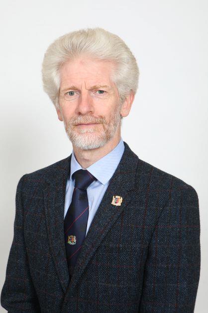 A portrait of Councillor Ivan Taylor.