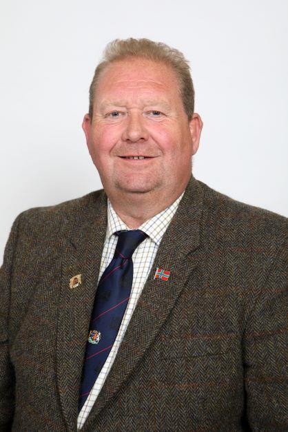 A portrait of Councillor Raymie Peace.
