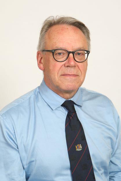 A portrait of Councillor & Deputy Council Leader, Sandy Cowie.