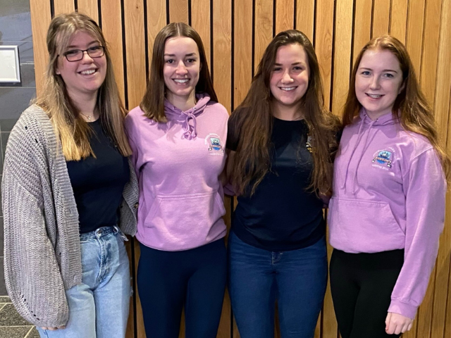 4 high school girls smiling