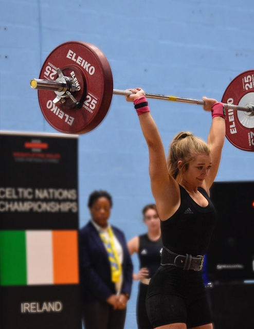 a young woman weightlifting