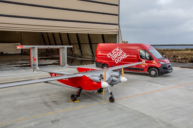 a drone plane and a royal mail van