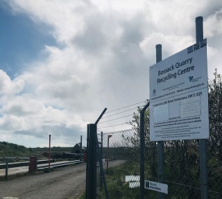 a sign for a recycling centre