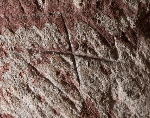Marks on red stone from within St Magnus Cathedral