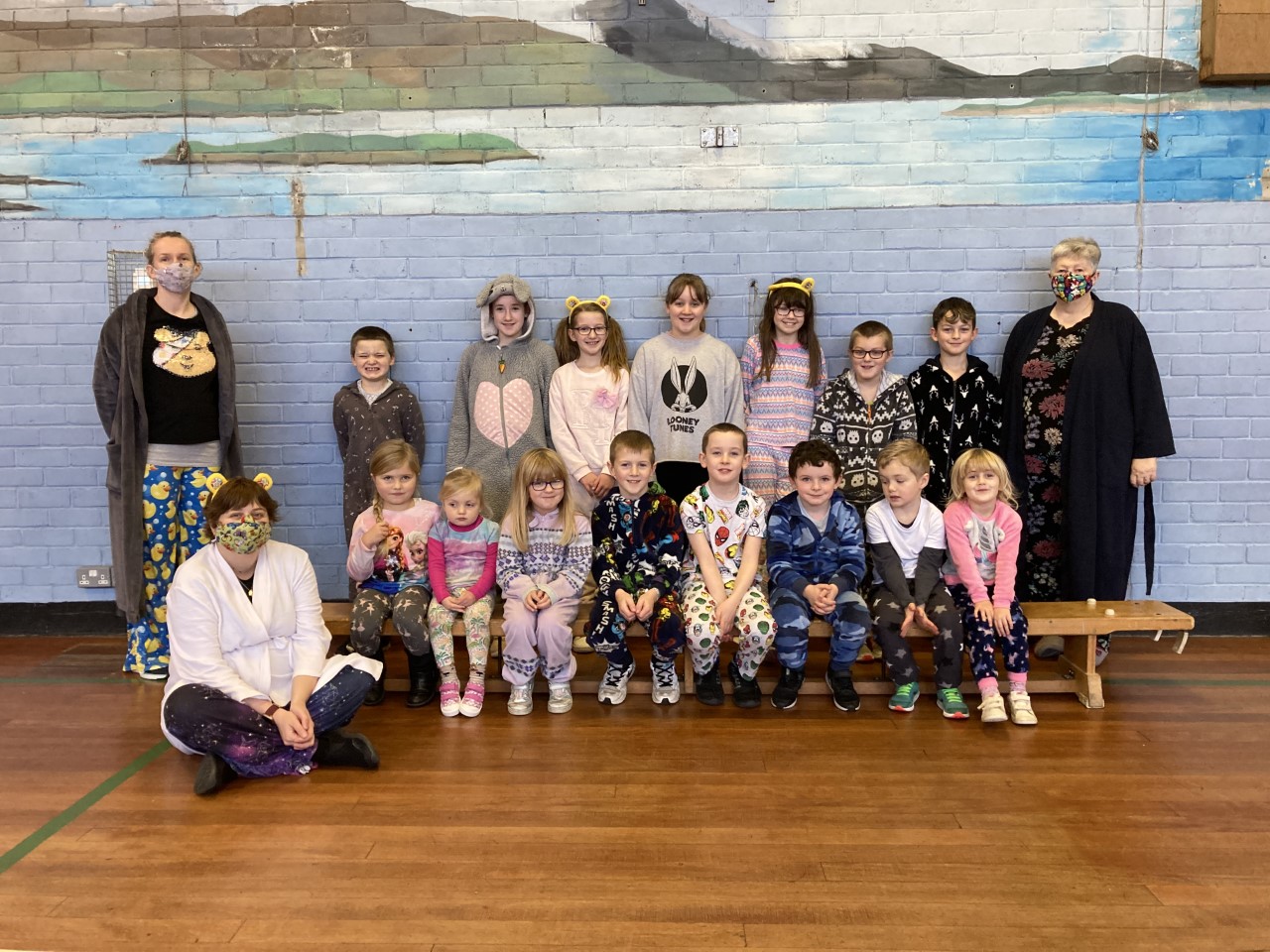 children and adults dressed up for children in need