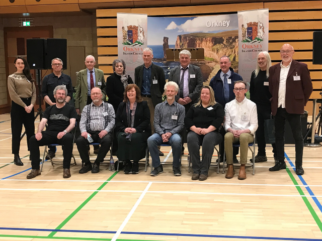 a photo of men and women at the voting centre