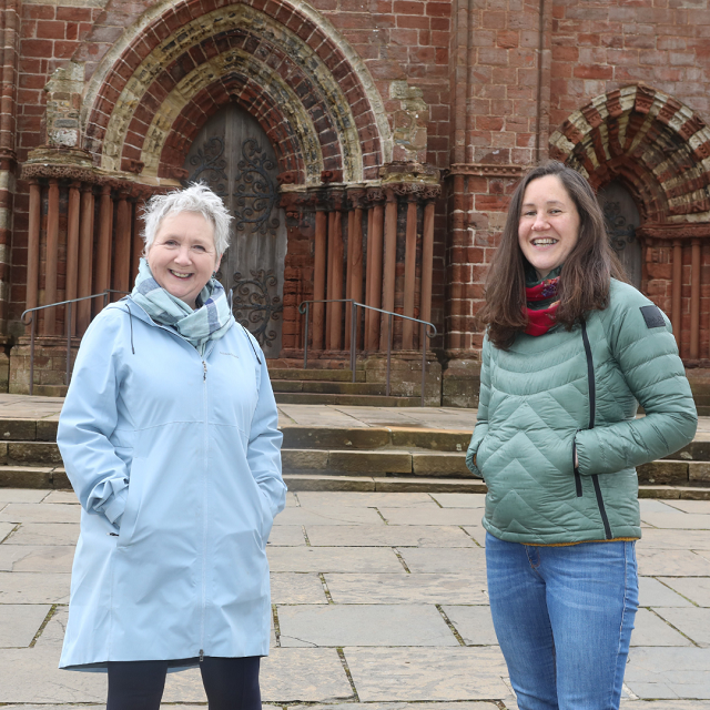 2 ladies standing in front of the St Magnus Cathedral