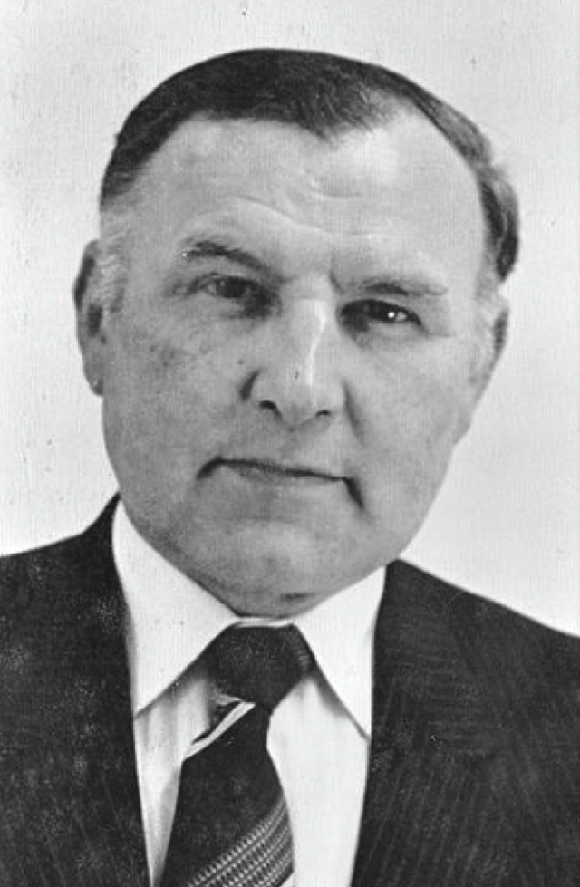 a black and white photo of a man