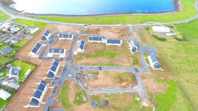 aerial view of new houses and the plot surrounding them