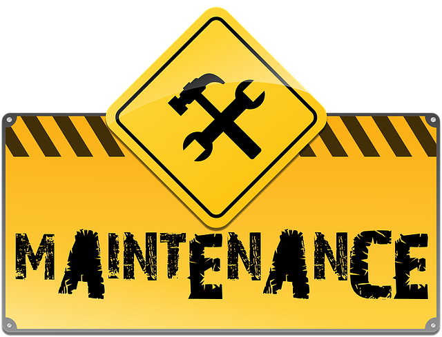 yellow and black maintenance sign