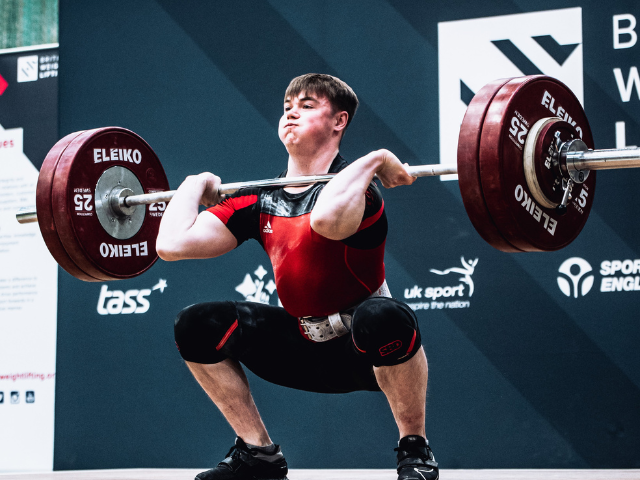 A young adult weightlifting
