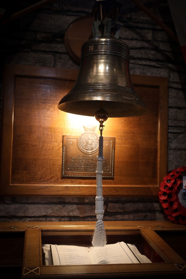 A bell with rope hanging in it