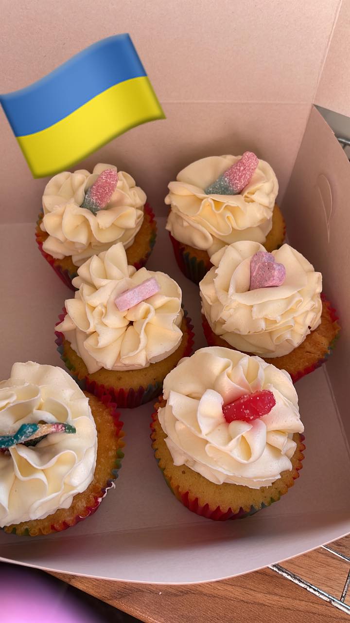 cupcakes with a Ukraine flag in one of them